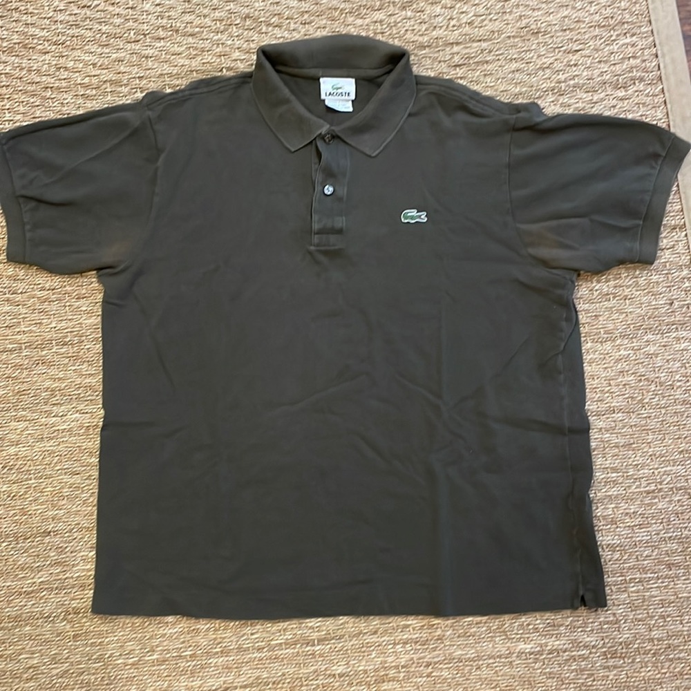Classic Lacoste polo. Size 6 is like a medium. Dark green color.